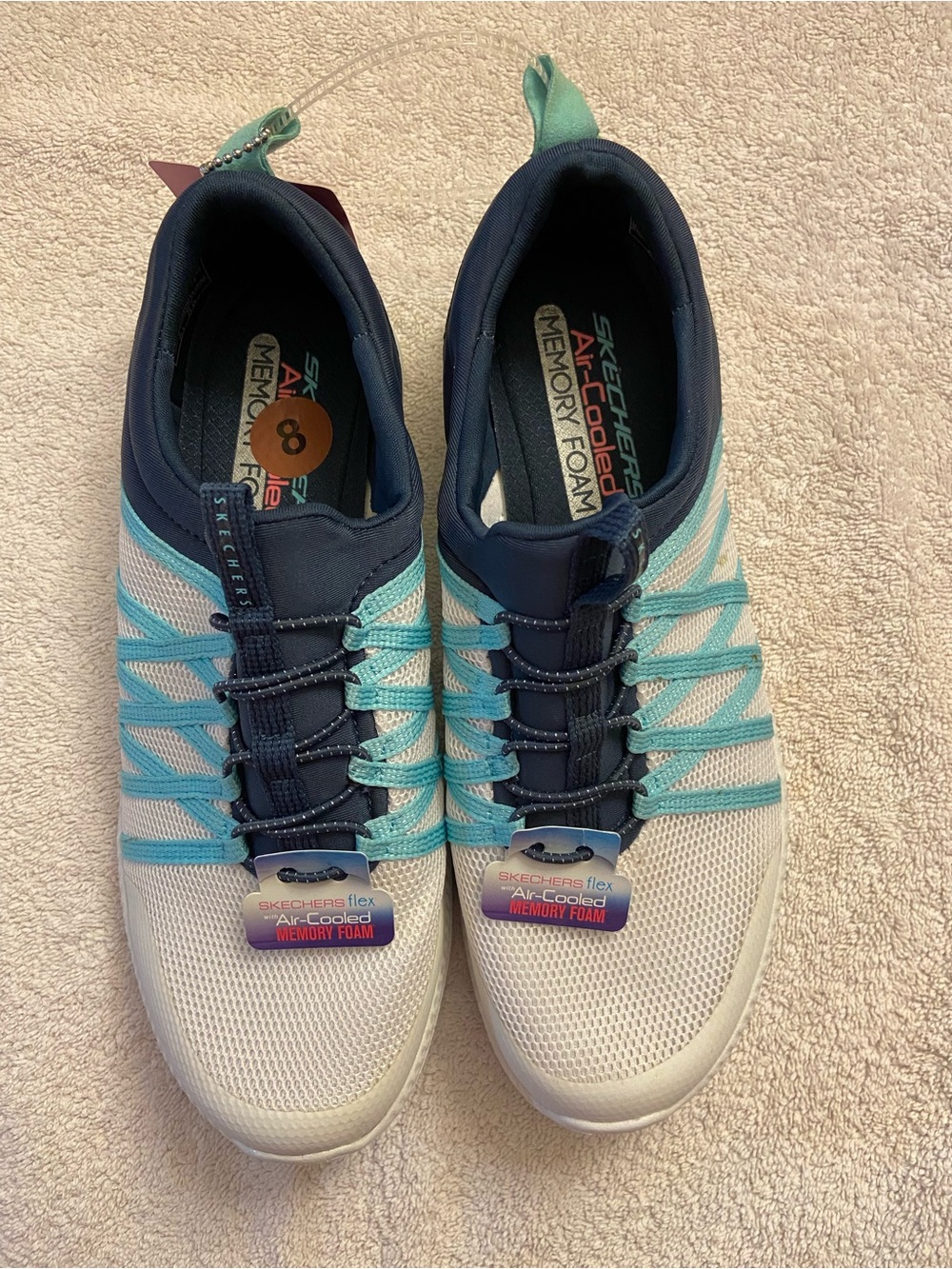 Skechers White and Teal Slip-On Athletic Sneakers